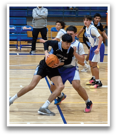 A group of people playing basketball on a court. AI generated content