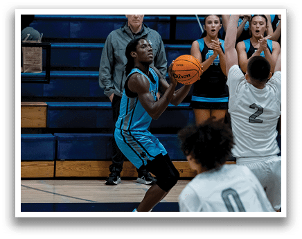 A basketball player in a blue uniform is holding a basketball while a crowd of people watch. AI generated content