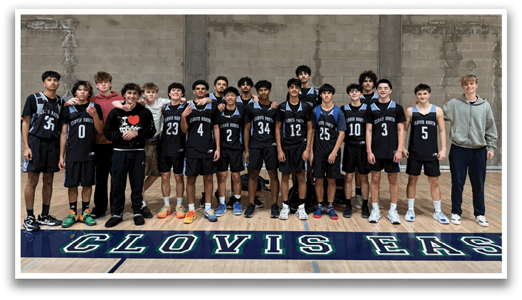A group of young men and women pose for a photo on a basketball court. AI generated content