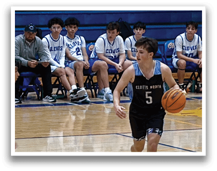 A basketball player is running with the ball while other players watch. AI generated content