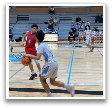 A group of young people playing basketball on a court. AI generated content