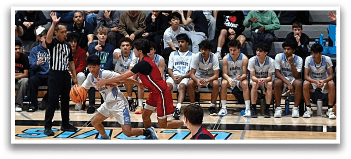 A group of people playing basketball on a court. AI generated content