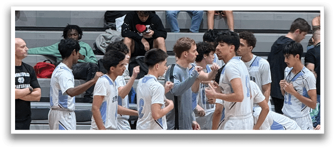 A group of young men are playing basketball on a court. AI generated content