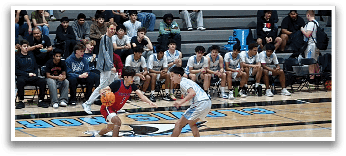 Two basketball players are on the court, one holding the ball and the other trying to get it. The players are surrounded by a crowd of people watching the game. AI generated content