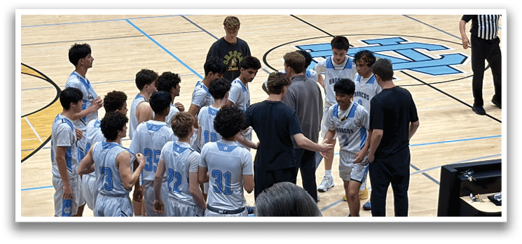 A group of young men are standing on a basketball court, engaged in a conversation. AI generated content