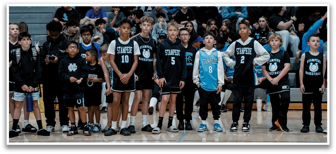 A group of young boys wearing basketball uniforms stand on a basketball court. AI generated content