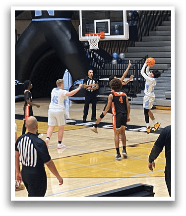A group of people playing basketball in a gym. AI generated content