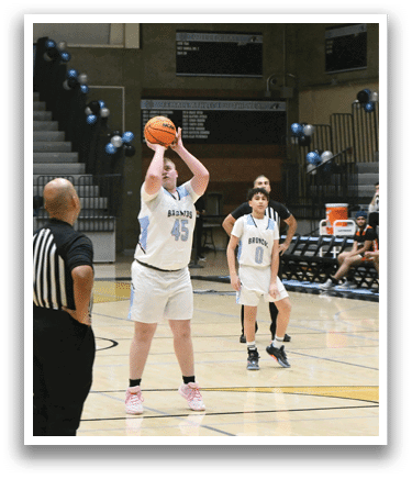 A basketball player is holding a basketball in his hands, preparing to shoot. AI generated content