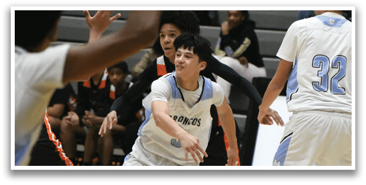 A group of people playing basketball on a court. AI generated content