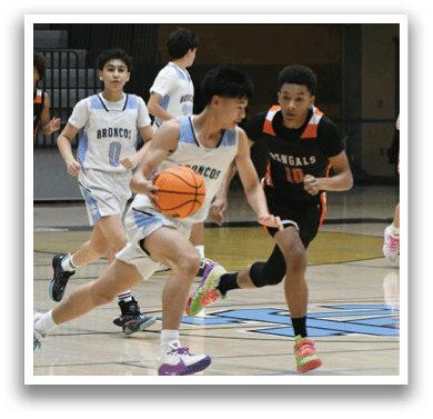 A group of people playing basketball, one of them holding a basketball. AI generated content