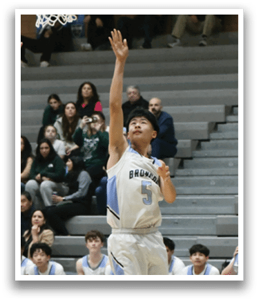 A basketball player is reaching up to grab the ball while others watch. AI generated content