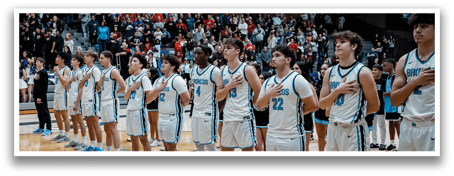 A group of young men wearing basketball uniforms are standing on a basketball court. AI generated content