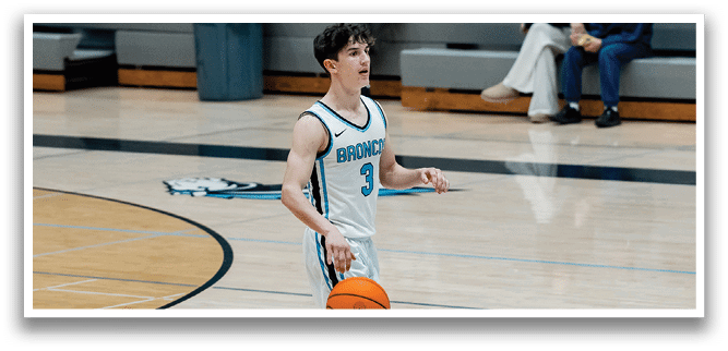 A man in a basketball uniform is holding a basketball on a court. AI generated content