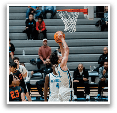 A basketball player is jumping in the air to shoot a basket. AI generated content