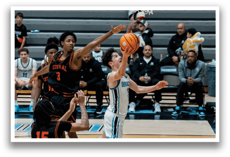 Basketball players on a court, one of them jumping to hit a ball. AI generated content