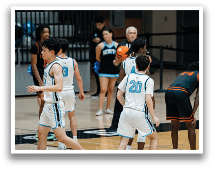A group of young men playing basketball on a court. AI generated content