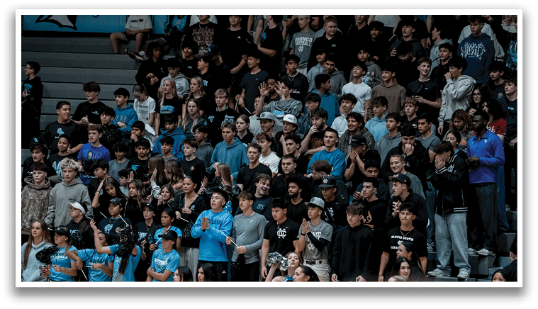A group of people are sitting in the bleachers, watching a game. AI generated content