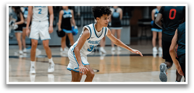 A basketball player wearing a white uniform with the number 33 on it is running on the court. AI generated content