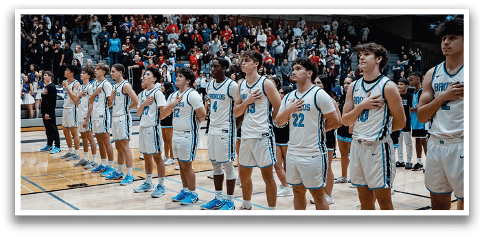 A group of young men wearing basketball uniforms are standing on a basketball court. AI generated content