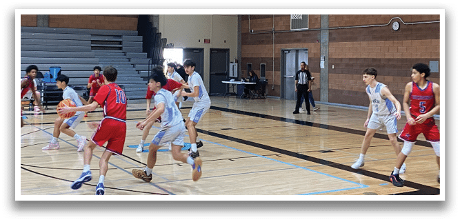 A group of young men playing basketball on a court. AI generated content
