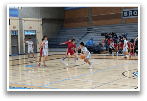 A group of young men playing basketball on a court. AI generated content