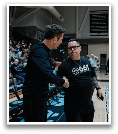 Two men shake hands in a gym. AI generated content