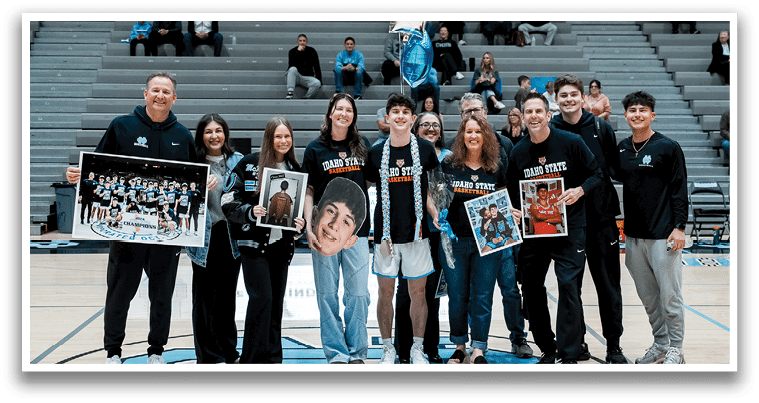 A group of people posing for a photo on a basketball court. AI generated content
