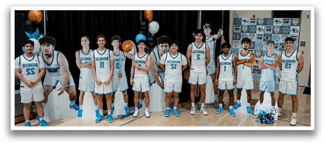 A group of basketball players pose for a picture on a basketball court. AI generated content