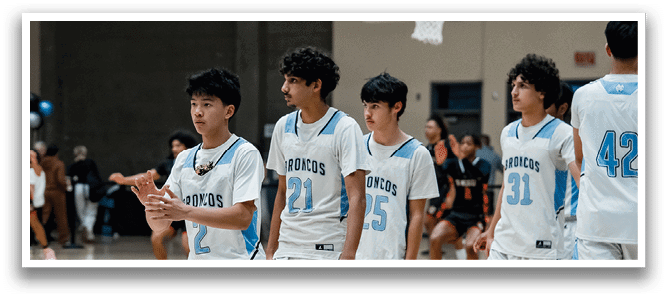 A group of young men are playing basketball on a court. AI generated content