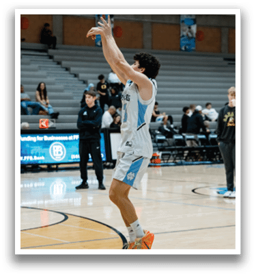 A basketball player in a blue and white uniform leaps in the air to catch a pass. AI generated content