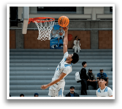 A basketball player is jumping up to dunk the ball through the hoop. AI generated content