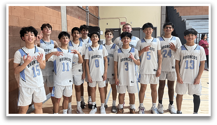 A group of young men wearing blue and white uniforms pose for a photo on a basketball court. AI generated content