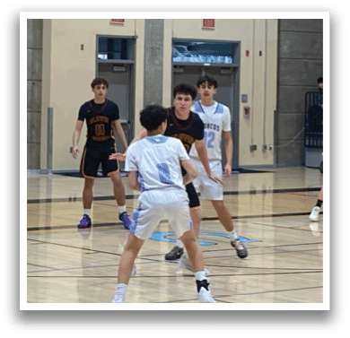 A group of young men playing basketball in a gym. AI generated content