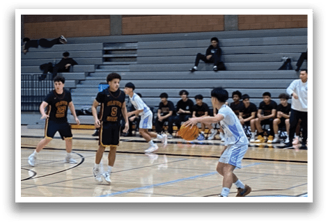 A group of young men playing basketball on a court. AI generated content