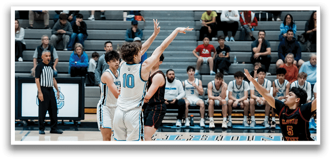 A group of men playing basketball on a court, with one player attempting to shoot the ball. AI generated content