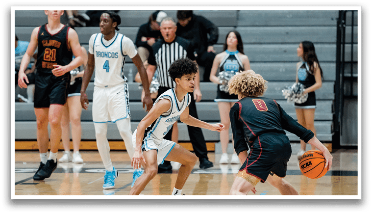 A group of young men playing basketball on a court. AI generated content