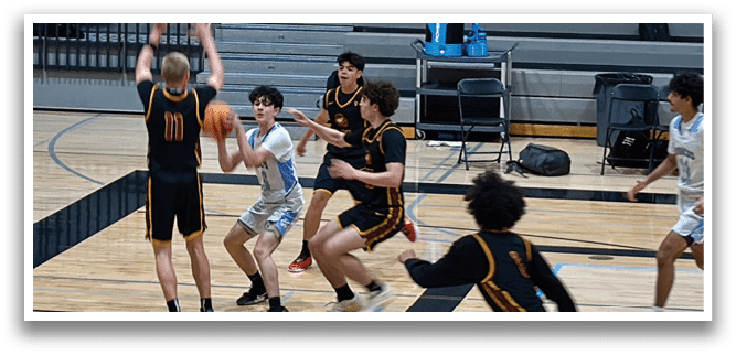 A group of young men playing basketball on a court. AI generated content