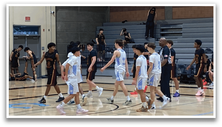 A group of young men playing basketball on a court. AI generated content