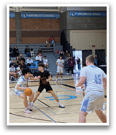 A group of people playing basketball in a gym. AI generated content