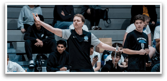 A group of young men playing basketball on a court. AI generated content