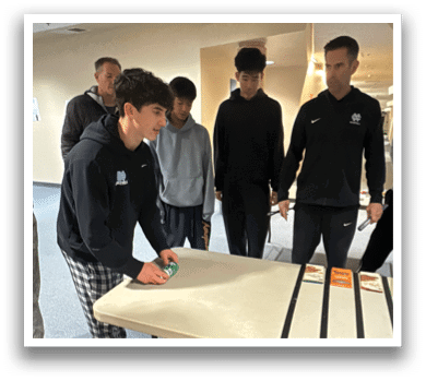 A group of people are playing a game on a table. AI generated content