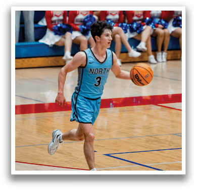 A basketball player wearing a blue jersey with the number 3 on it is running with a basketball in his hand. AI generated content