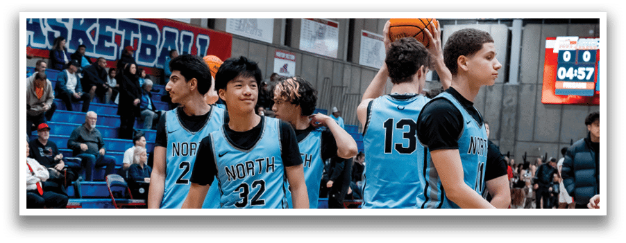 A group of young men wearing blue basketball uniforms stand on a basketball court. AI generated content