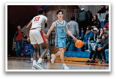 Basketball players on a court with a crowd watching. One player is holding a basketball. AI generated content