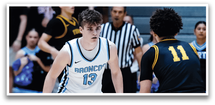 Two basketball players are on the court, one wearing a blue and white uniform and the other wearing a black uniform. The players are in the middle of the court, with one player holding a basketball. AI generated content