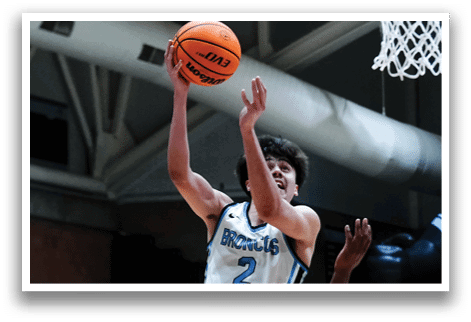 Two basketball players are playing in a game, one is jumping to shoot the ball while the other is trying to block the shot. AI generated content