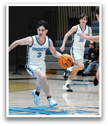 A group of men playing basketball on a court. AI generated content