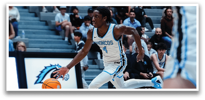 A basketball player in a blue and white uniform is running with a basketball in his hand. AI generated content