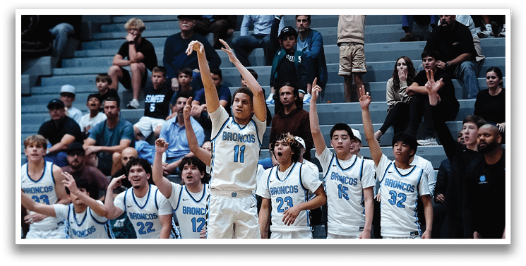 A basketball player is about to shoot the ball while his teammates watch. AI generated content