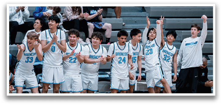 A group of young men are sitting on a bench, celebrating a victory. AI generated content
